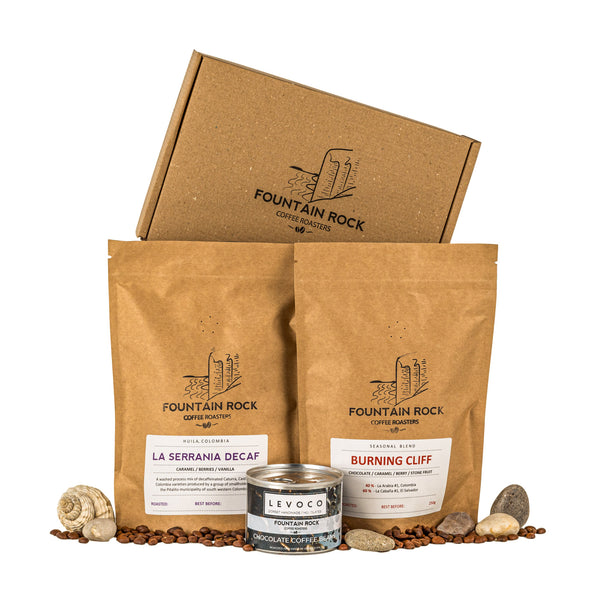 Burning Cliff Seasonal Blend, Seasonal decaf and chocolate covered coffee beans in an attractive box.