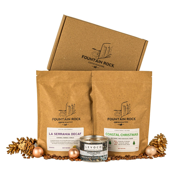 Coastal Christmas Seasonal Blend, Seasonal decaf and chocolate covered coffee beans in an attractive box. 