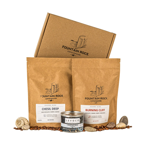 Our two seasonal coffee blends and chocolate covered chocolate beans in an attractive box. 